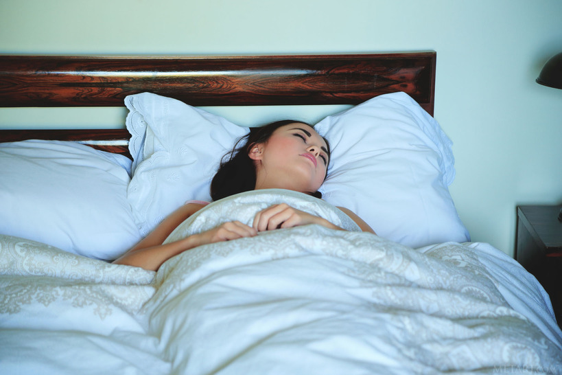 Petite, bespectacled beauty Li Moon reads a book in bed 1