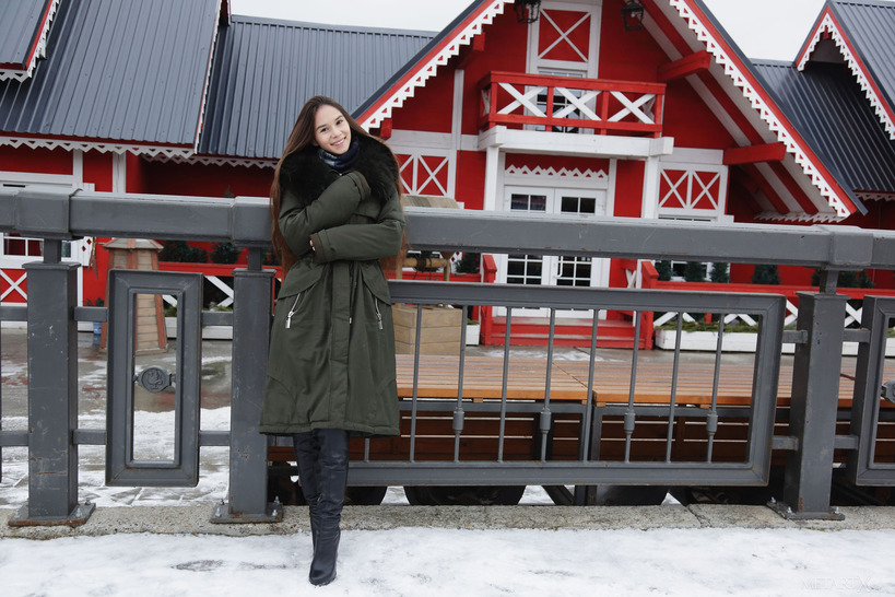 Take a trip to a winter wonderland with stunning Leona Mia, then feel the temperature soar as she takes off her cozy sweater to  1